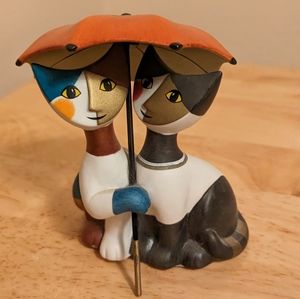 Porcelain umbrella cats